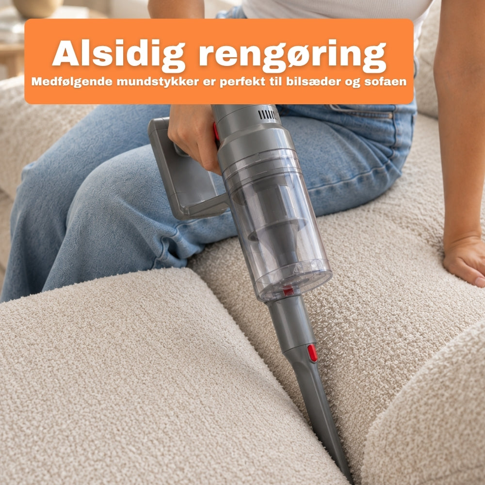 Håndstøvsuger på sofaen